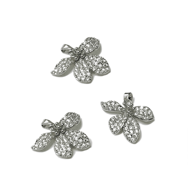 DIJE FLOR 15X22MM - BAÑO DE RODIO