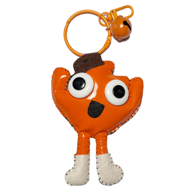 LLAVEROS PERSONAJES MUÑECOS - NARANJA