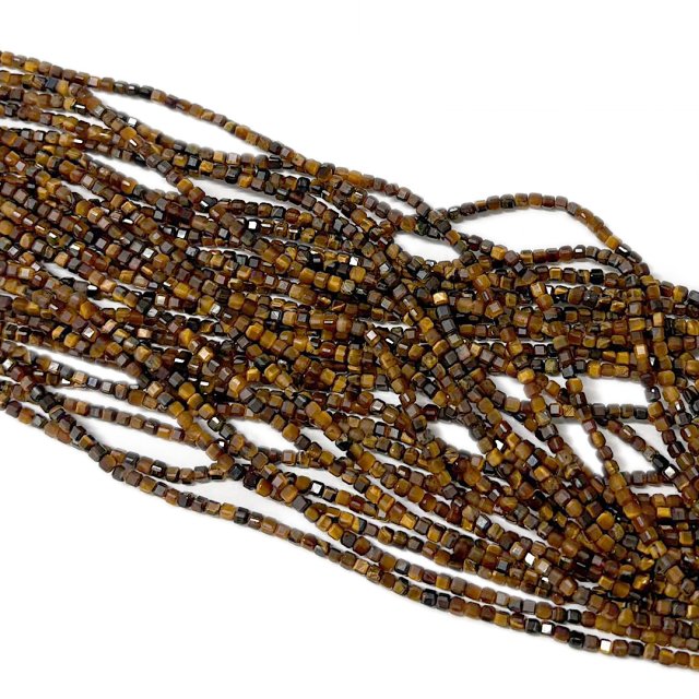 PIEDRAS CUBOS 2MM FACETADAS - OJO DE TIGRE