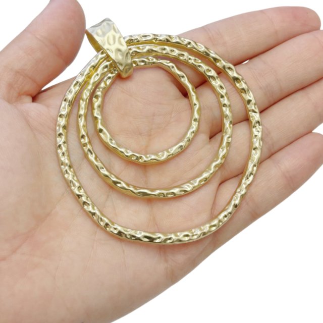 DIJE MEDALLA CIRCULO ARANDELAS XL 70MM - DORADO MATE