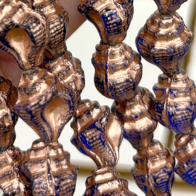 CRISTAL CHECO COBRE CARACOL 15X11MM (X TIRA)