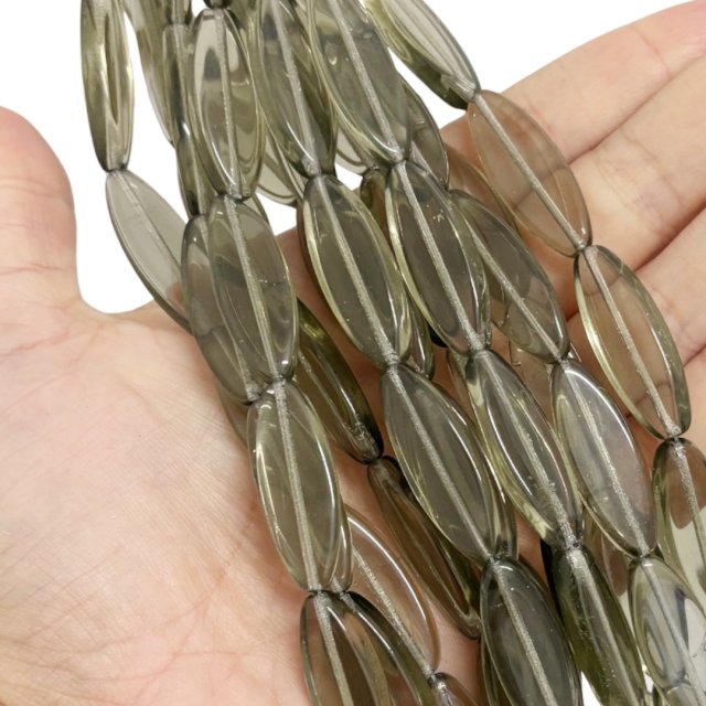 CRISTAL CHECO GRIS VERDOSO OVAL 30X11MM (X TIRA)