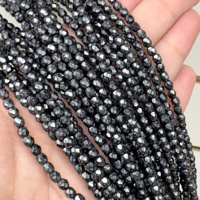 CRISTAL CHECO FACETADO 4MM JASPEADO GRIS (X TIRA)