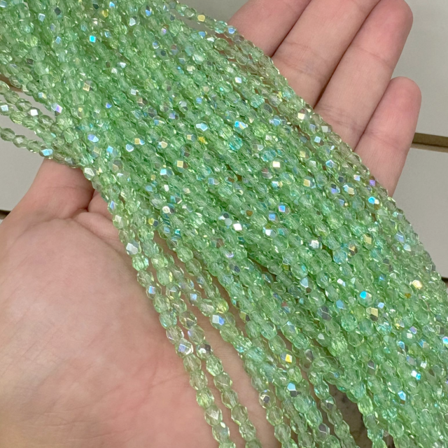 CRISTAL CHECO FACETADO 4MM TRANSPARENTE TORNASOL VERDE CLARO (X TIRA)