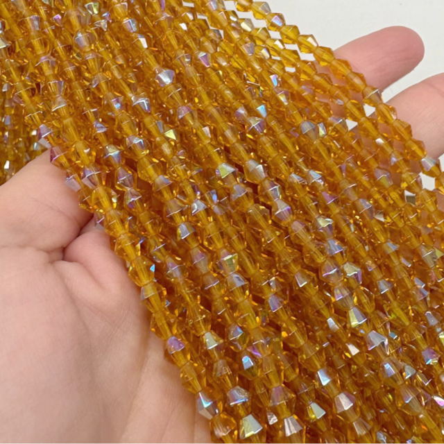 CRISTAL CHECO FACETADO ROMBO 5MM TORNASOL AMBAR (X TIRA)