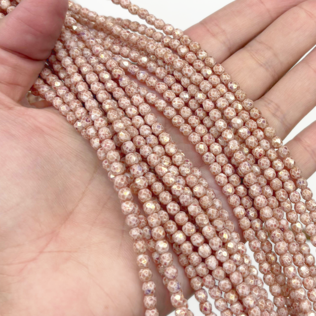 CRISTAL CHECO FACETADO 4MM ROSADO - BEIGE JASPEADO (X TIRA)